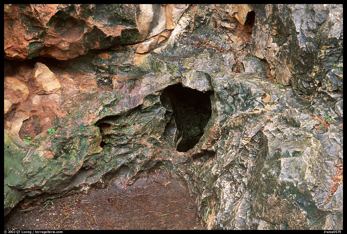 Cave mouth, where strong winds equalize pressure between inside outside. Wind Cave  National Park, South Dakota, USA.