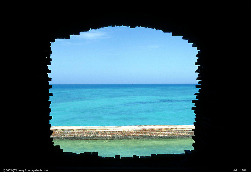 Turquoise waters framed by a cannon embrasure in Fort Jefferson. Dry Tortugas  National Park, Florida, USA.