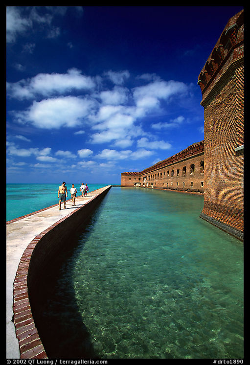 Visitors stroll on the seawall. Dry Tortugas  National Park