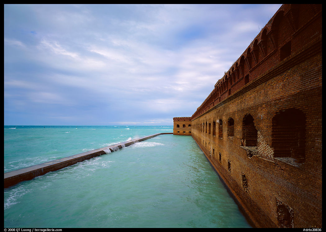 Fort Jefferson massive brick wall overlooking the ocean, cloudy weather. Dry Tortugas  National Park, Florida, USA.
