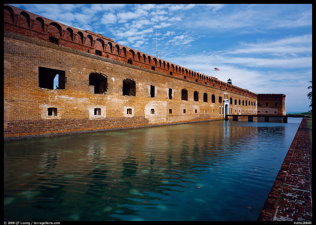 Fort Jefferson moat, walls and lighthouse. Dry Tortugas  National Park, Florida, USA.