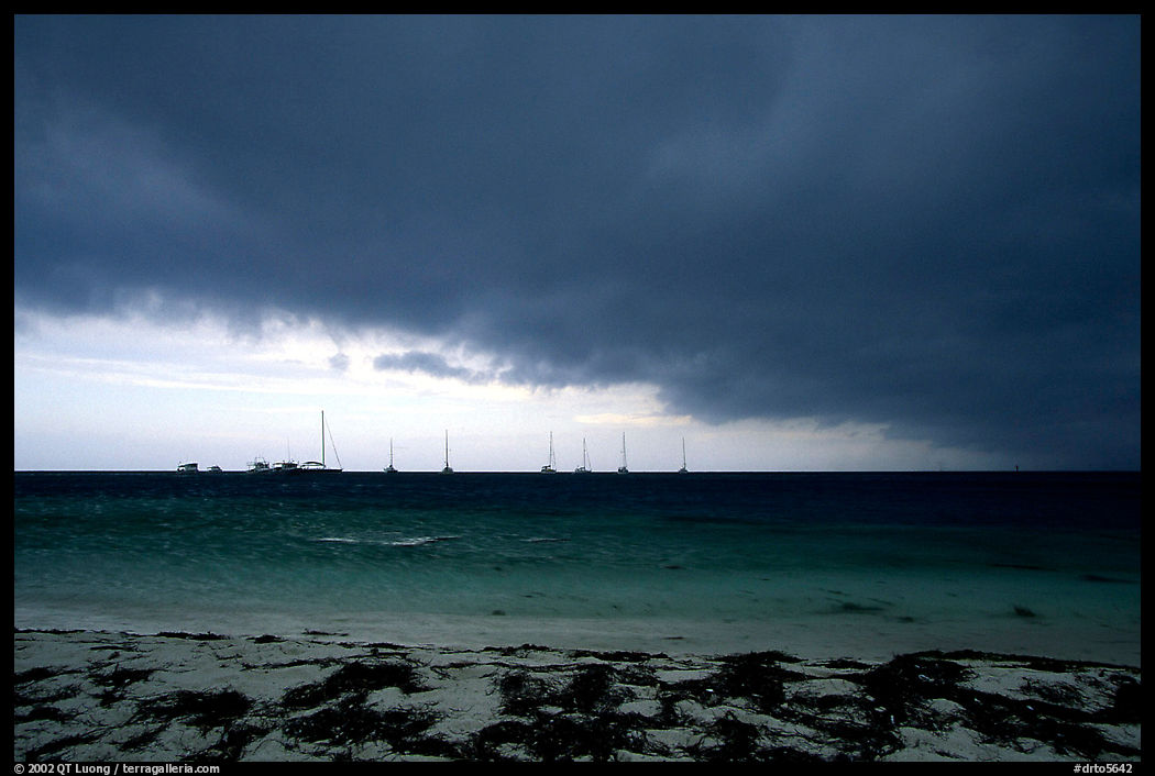 Approaching storm over Yachts at Tortugas anchorage. Dry Tortugas  National Park, Florida, USA.