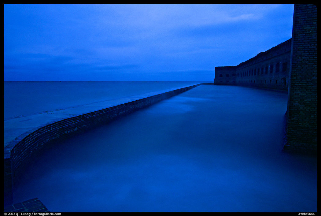 Seawall at dusk during  storm. Dry Tortugas  National Park, Florida, USA.