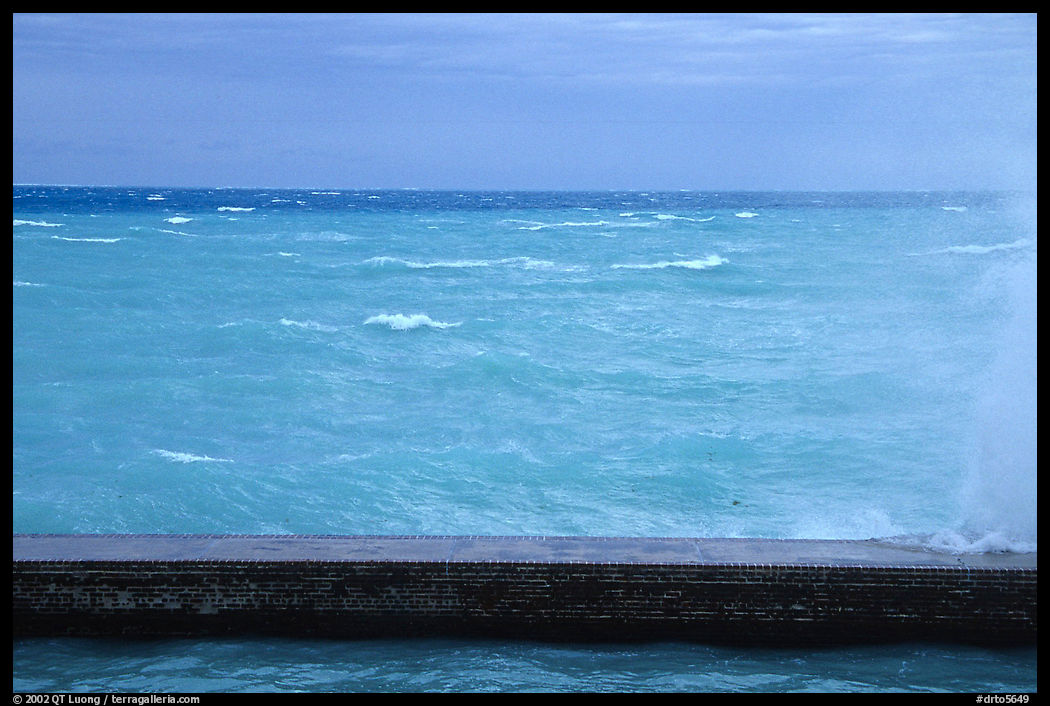 Seawall battered by surf on a stormy day. Dry Tortugas  National Park, Florida, USA.