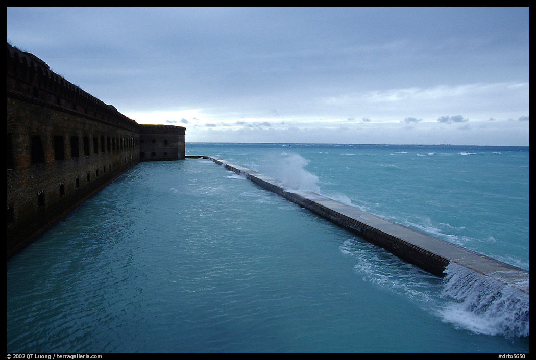 Seawall and moat with waves on stormy day. Dry Tortugas  National Park