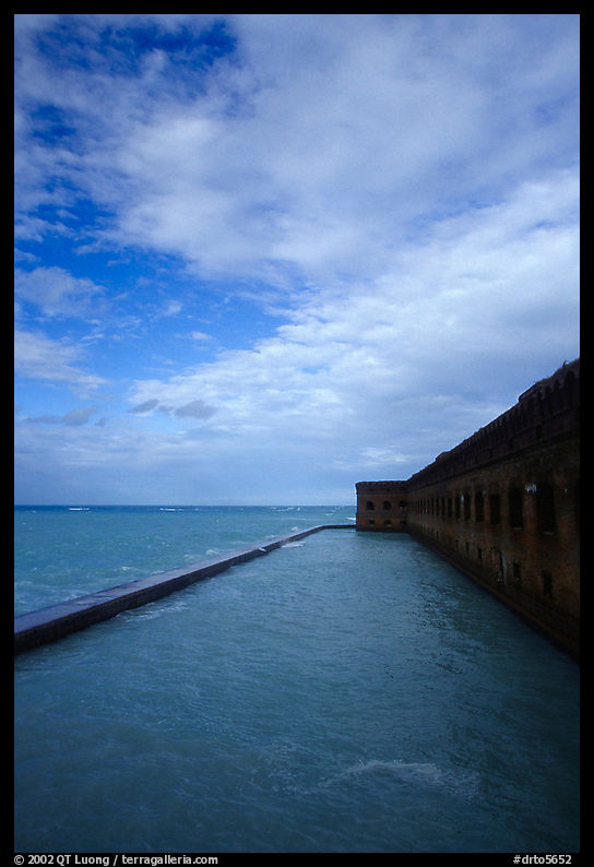Sky, seawall and moat on windy day. Dry Tortugas  National Park, Florida, USA.