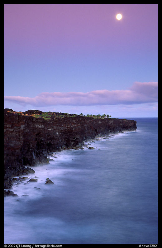 Holei Pali volcanic cliffs and moon at dusk. Hawaii Volcanoes National Park, Hawaii, USA.