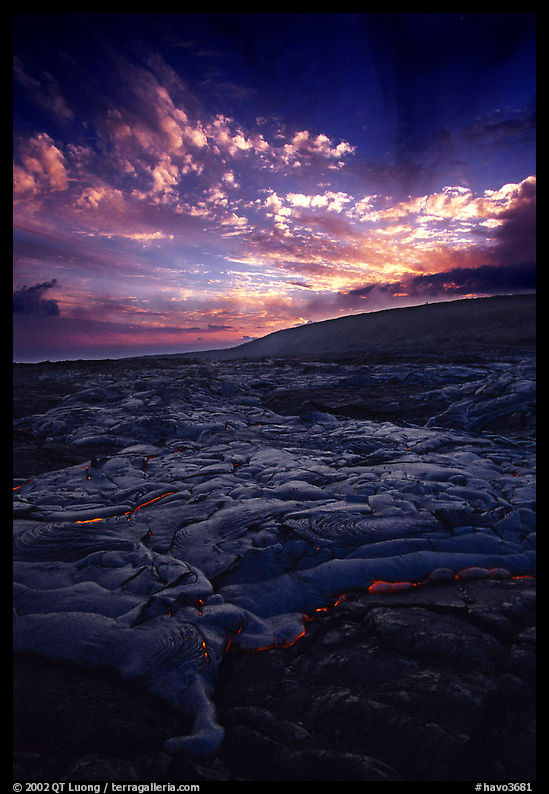 Live lava flow on coastal plain sunset. Hawaii Volcanoes National Park, Hawaii, USA.