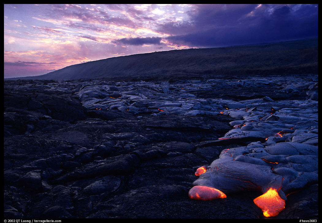 Live lava advancing at sunset,  Chain of Craters road. Hawaii Volcanoes National Park, Hawaii, USA.