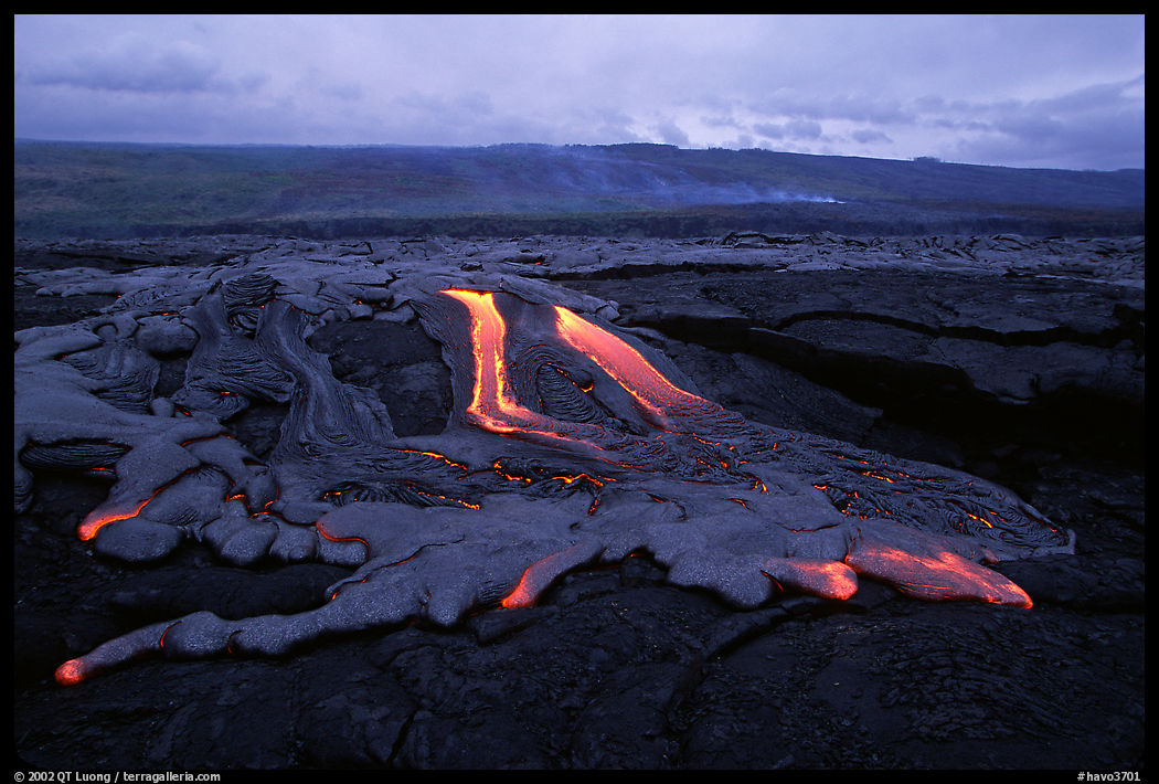 Molten lava flow at dawn on coastal plain. Hawaii Volcanoes National Park