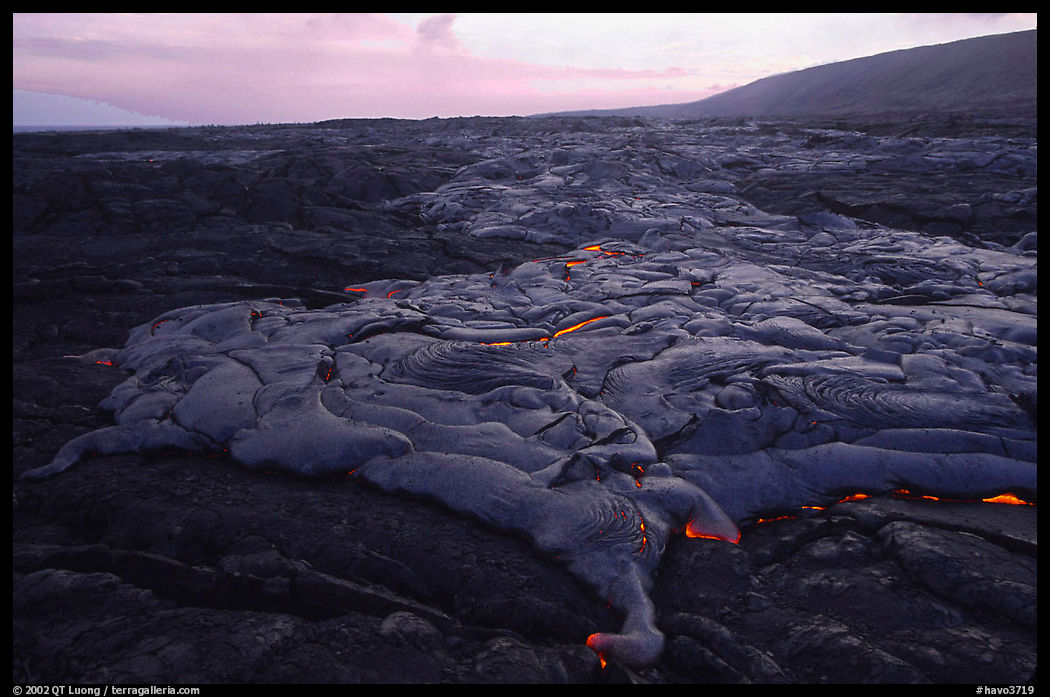 Live lava flow at sunset near the end of Chain of Craters road. Hawaii Volcanoes National Park