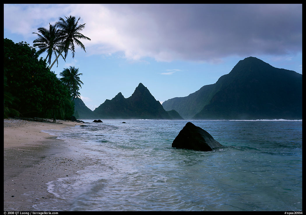 Sunuitao Peak and Piumafua mountain on Olosega Island from the South Beach, Ofu Island. National Park of American Samoa