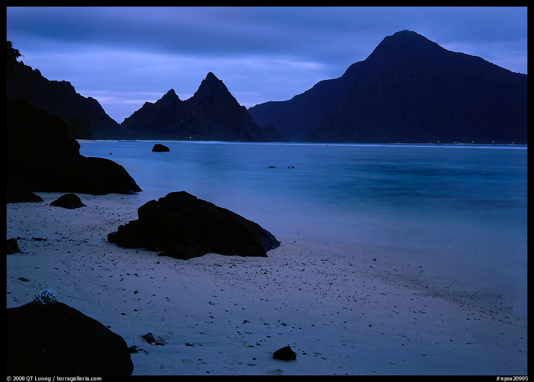 Beach and pointed peaks at dusk, Ofu Island. National Park of American Samoa