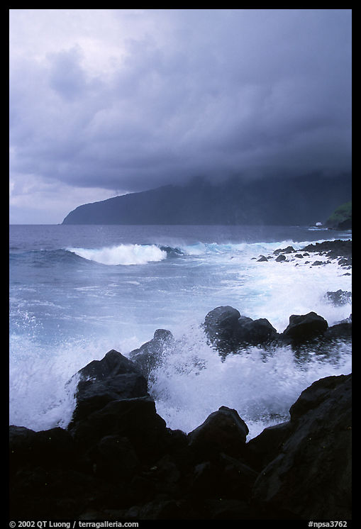 Stormy seascape with crashing waves and clouds, Siu Point, Tau Island. National Park of American Samoa