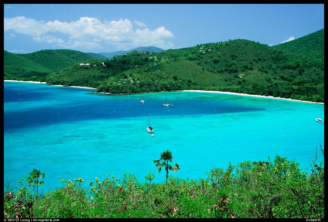 Turquoise waters in Francis Bay with anchored yacht. Virgin Islands National Park, US Virgin Islands.