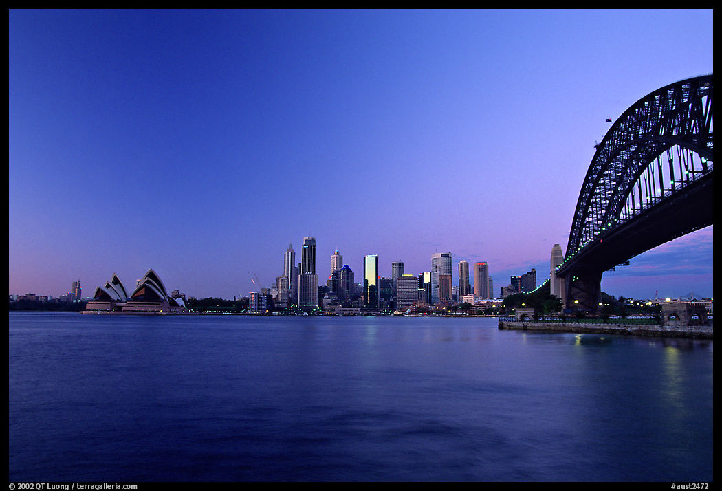 Harbour bridge, city skyline and opera house, dawn. Sydney, New South Wales, Australia