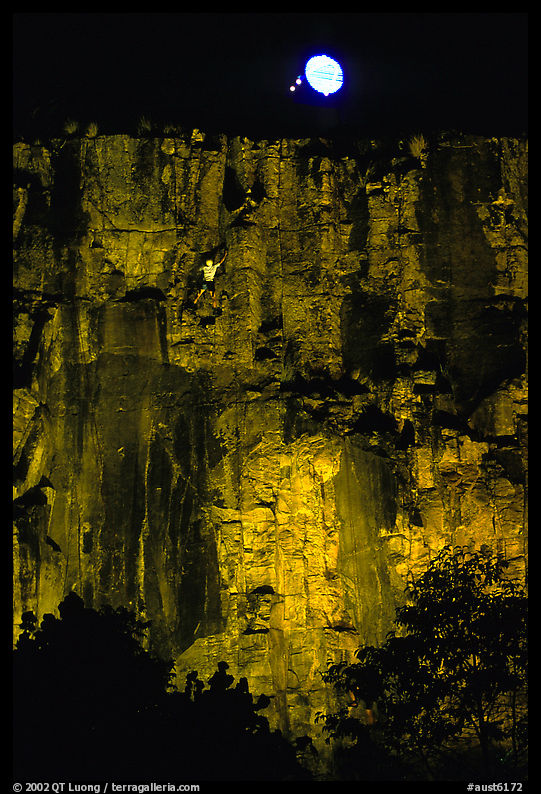 Rock climbing on the banks of the Brisbane River at night. Brisbane, Queensland, Australia