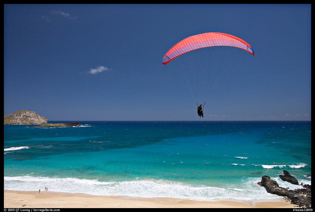 Paragliding above Makapuu Beach. Oahu island, Hawaii, USA