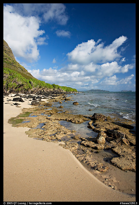 Beach and rocks near Makai research pier,  early morning. Oahu island, Hawaii, USA