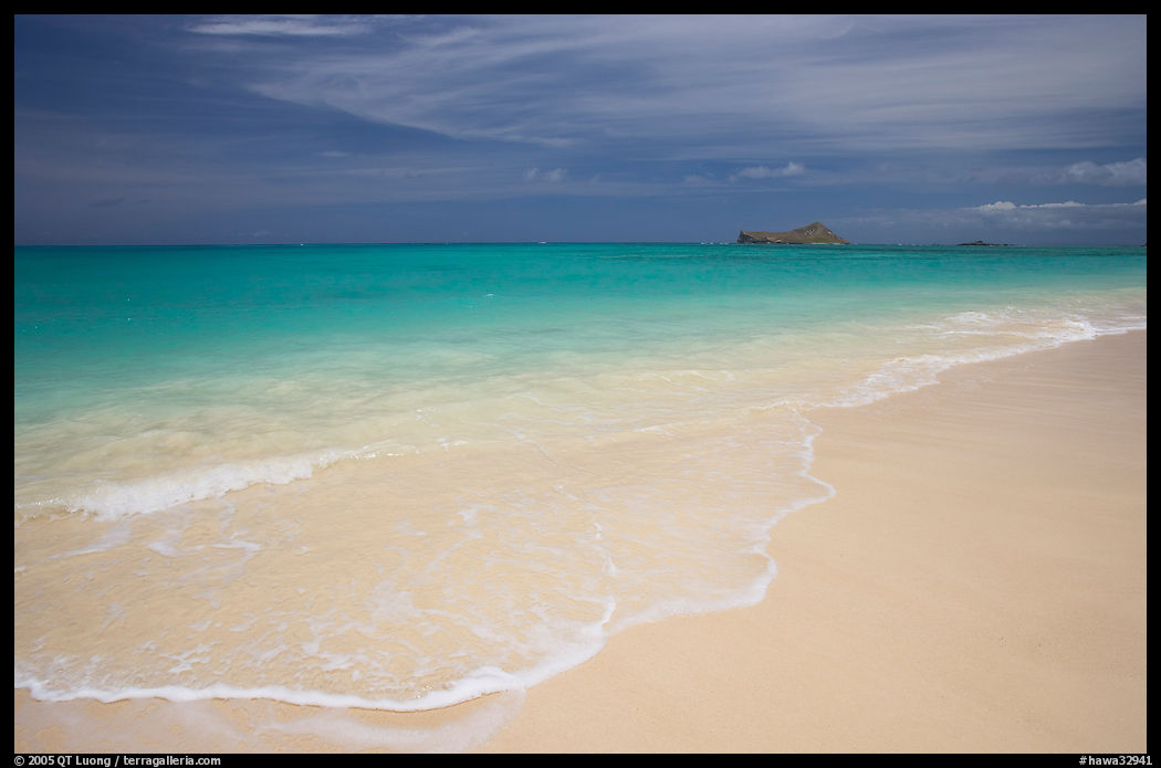 Waimanalo Beach and ocean with turquoise waters and off-shore island. Oahu island, Hawaii, USA