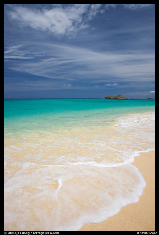 Foam, sand, and turquoise waters, Waimanalo Beach. Oahu island, Hawaii, USA