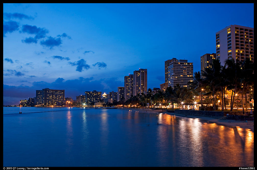 Waterfront and high-rise hotels at dusk. Waikiki, Honolulu, Oahu island, Hawaii, USA