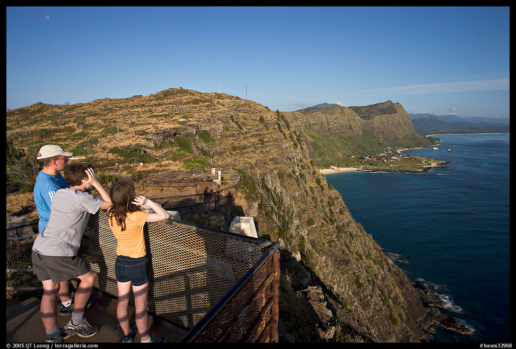 Family on the lookout on the summit of Makapuu head, early morning. Oahu island, Hawaii, USA