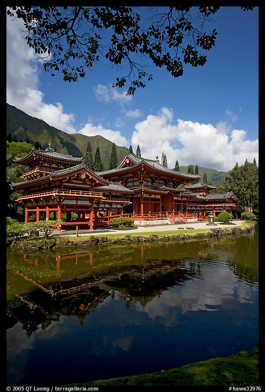 Byodo-In temple reflected in pond, Valley of the Temples, morning. Oahu island, Hawaii, USA