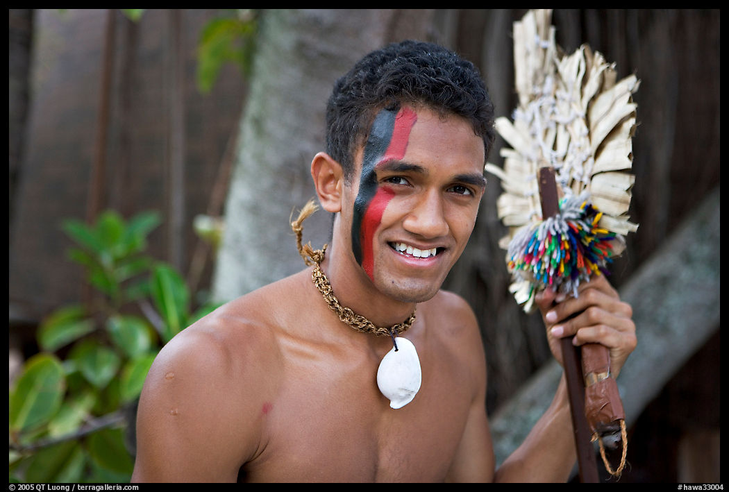 Fiji man with traditional face painting. Polynesian Cultural Center, Oahu island, Hawaii, USA