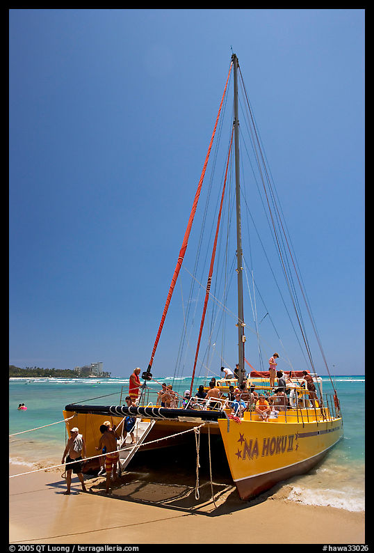 Catamaran landing on Waikiki Beach. Waikiki, Honolulu, Oahu island, Hawaii, USA