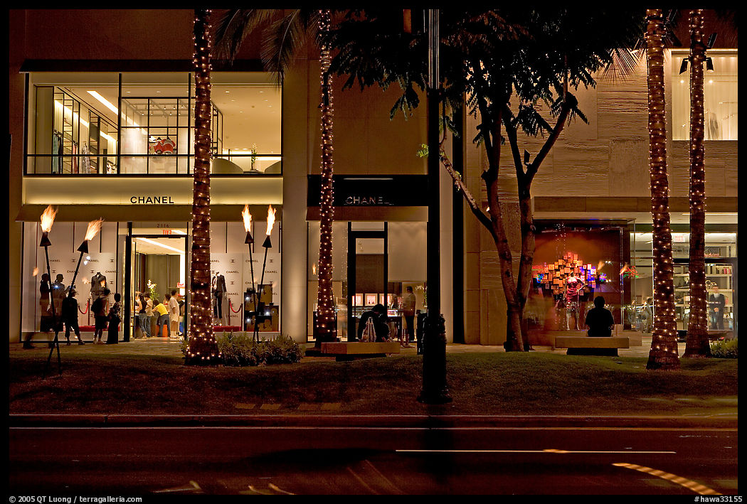 Shopping section of Kalakaua avenue at night. Waikiki, Honolulu, Oahu island, Hawaii, USA