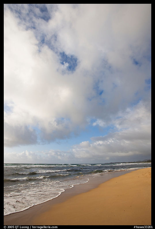 Beach, ocean, and clouds, Lydgate Park, early morning. Kauai island, Hawaii, USA