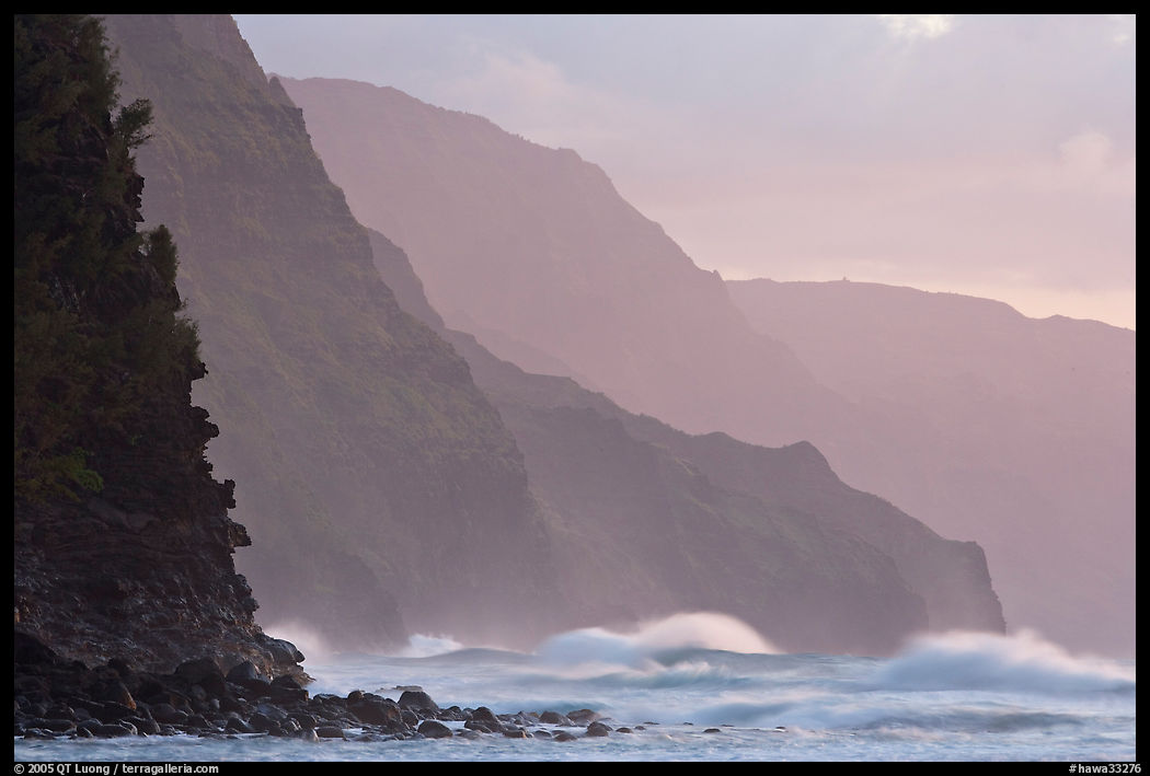 Na Pali Coast and surf seen from Kee Beach, sunset. Kauai island, Hawaii, USA