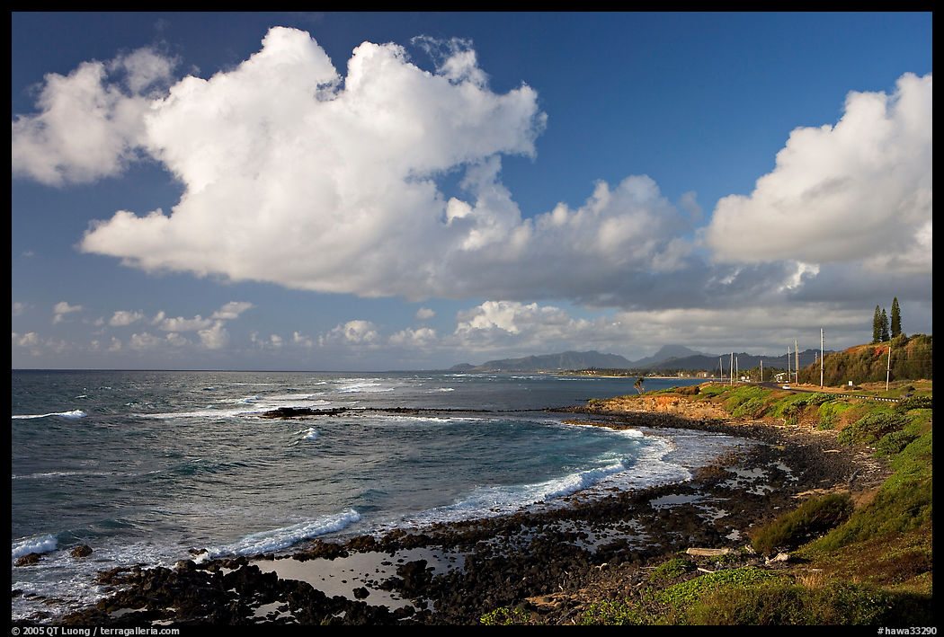 Coast north of Kapaa with Sleeping Giant profile, early morning. Kauai island, Hawaii, USA