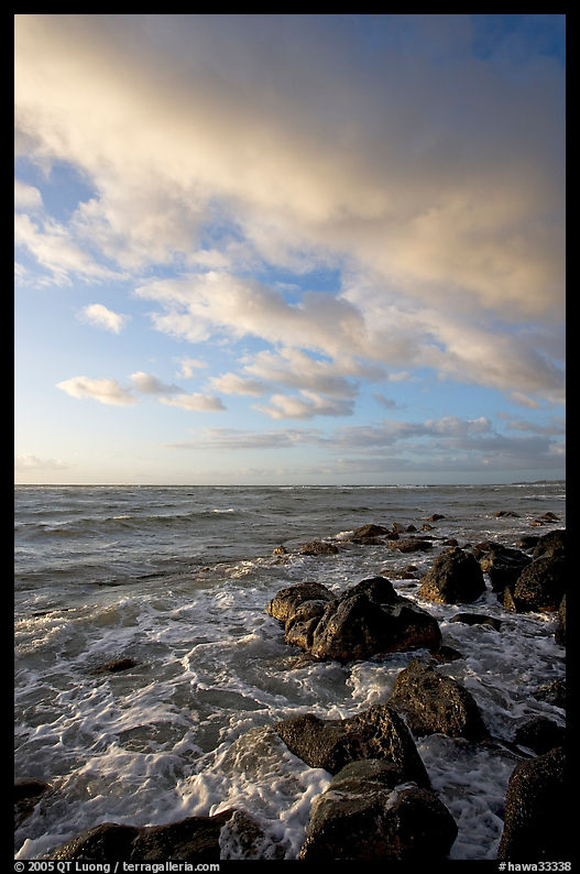 Boulders and ocean, Lydgate Park, sunrise. Kauai island, Hawaii, USA