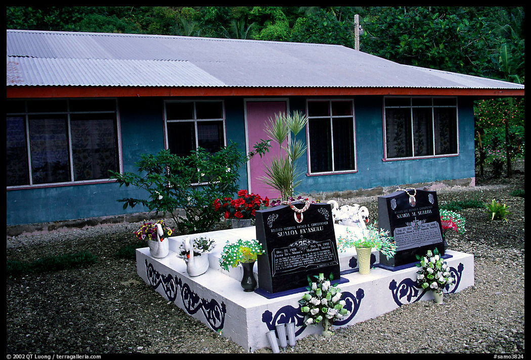 Tombs in front of a home in Faleasao. American Samoa
