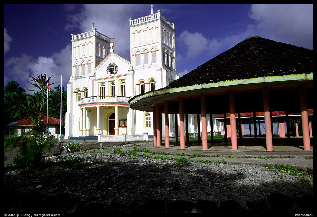 Church and fale in Leone. Tutuila, American Samoa