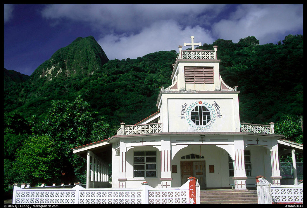 Church and verdant hills in Afono. Tutuila, American Samoa