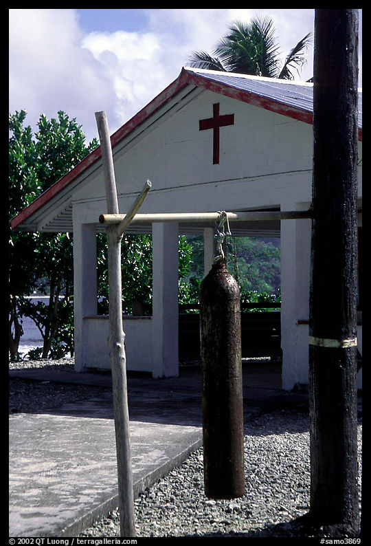 Gong and church, Aunuu village. Aunuu Island, American Samoa