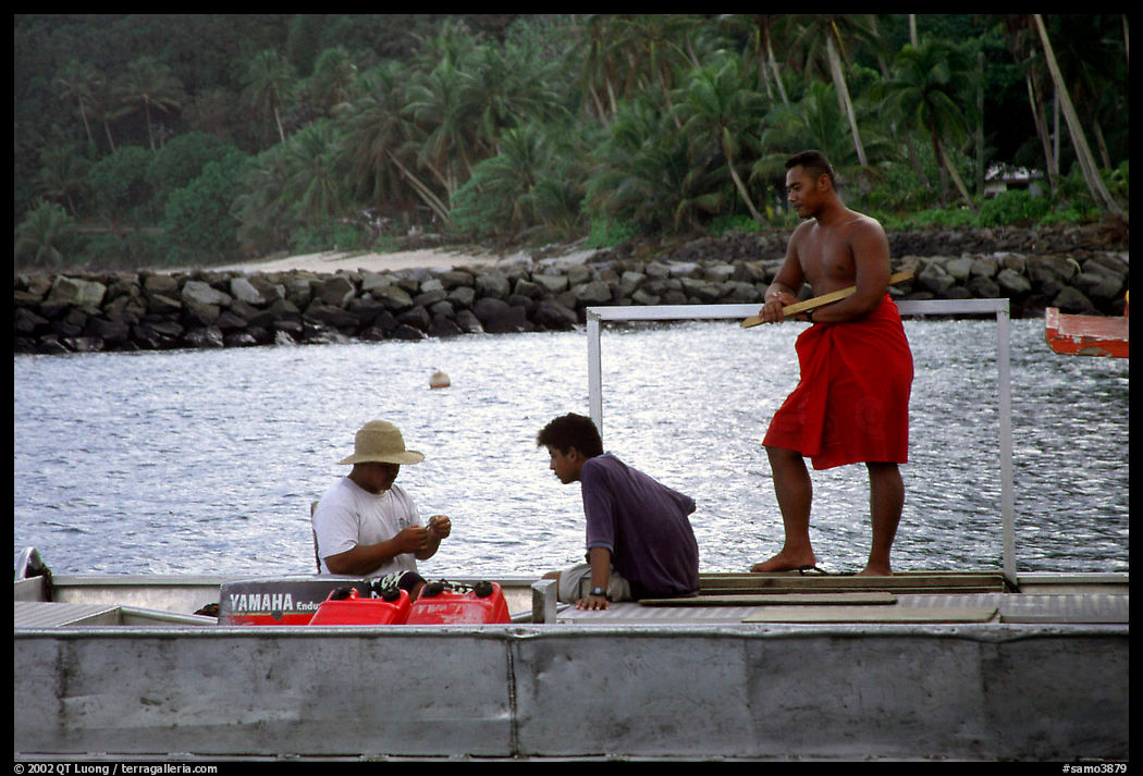 Men on a ferry to Aunuu. Aunuu Island, American Samoa
