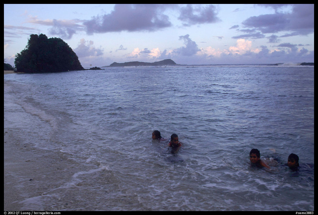 Children in the water. Tutuila, American Samoa