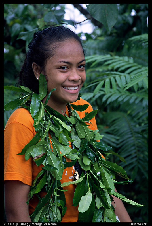 Girl with ornemental leaves in traditional fashion. Pago Pago, Tutuila, American Samoa