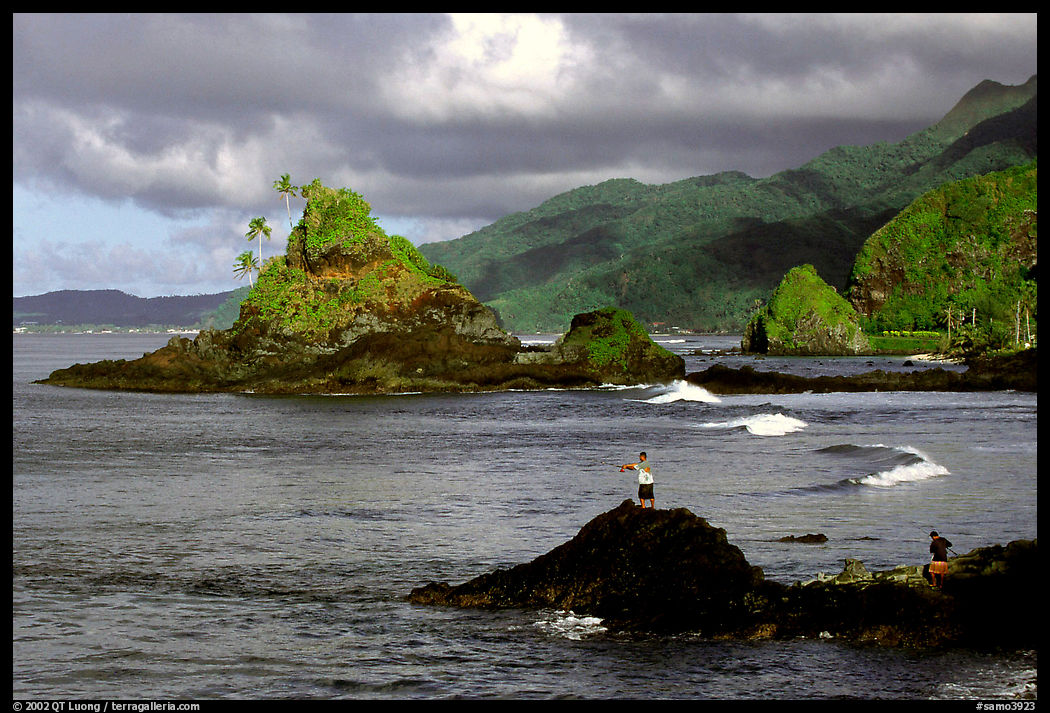 Fishermen on the rocky shore near Maa Kamela. Tutuila, American Samoa