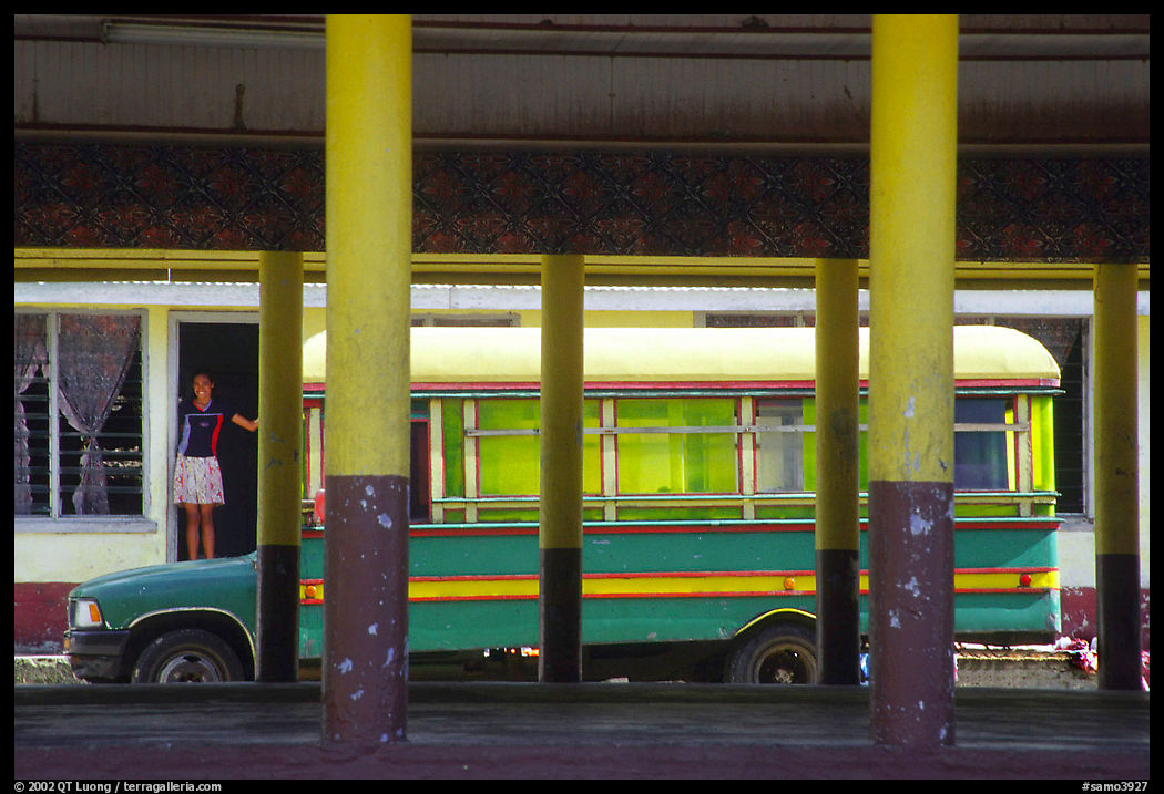 Bus and fale in Masefau village. Tutuila, American Samoa