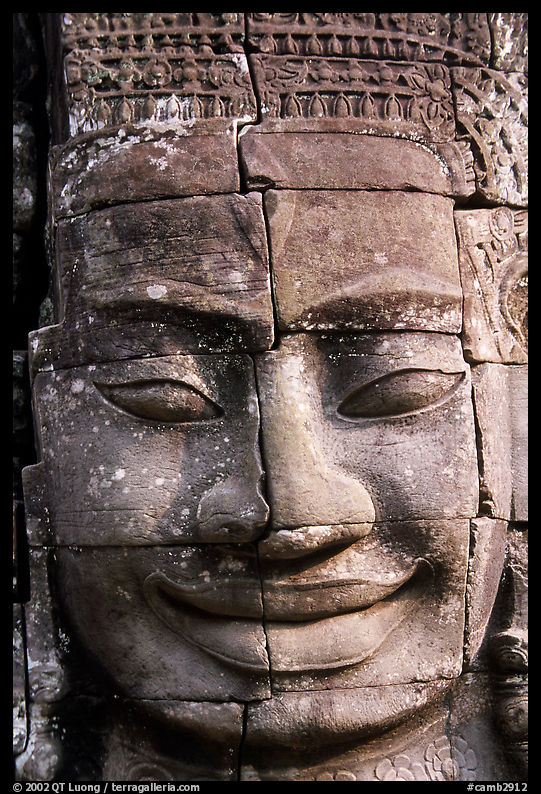 Enigmatic stone smiling face, the Bayon. Angkor, Cambodia