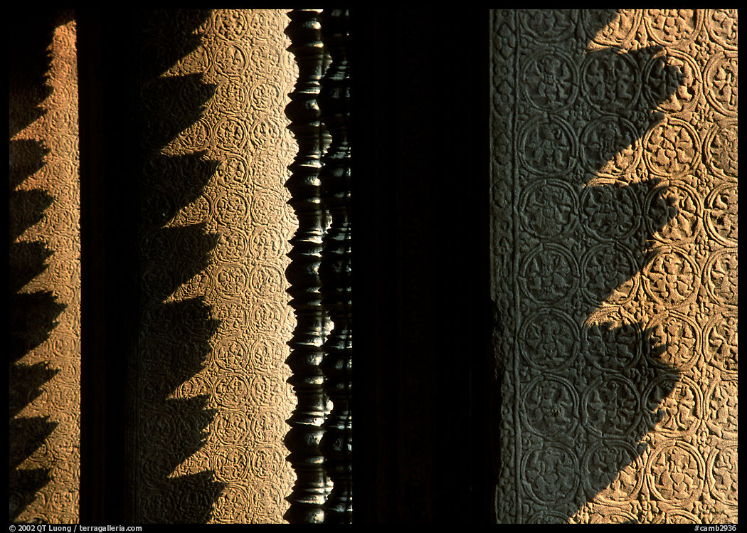 Shadow patters of the circular columns projected on wall, Angkor Wat. Angkor, Cambodia