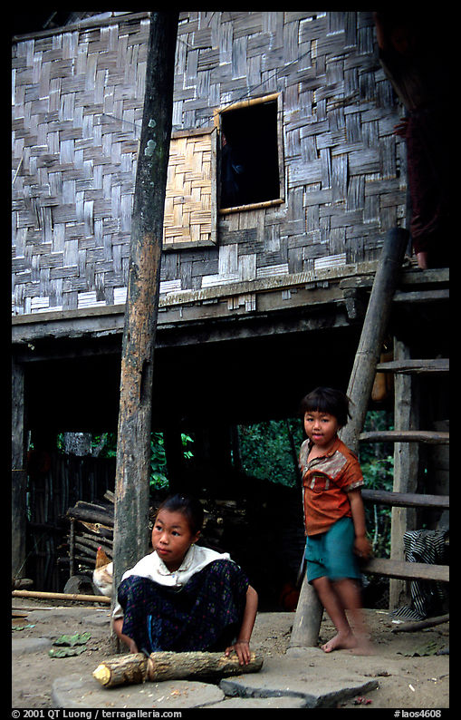 Children near stilt house of a small hamlet. Mekong river, Laos