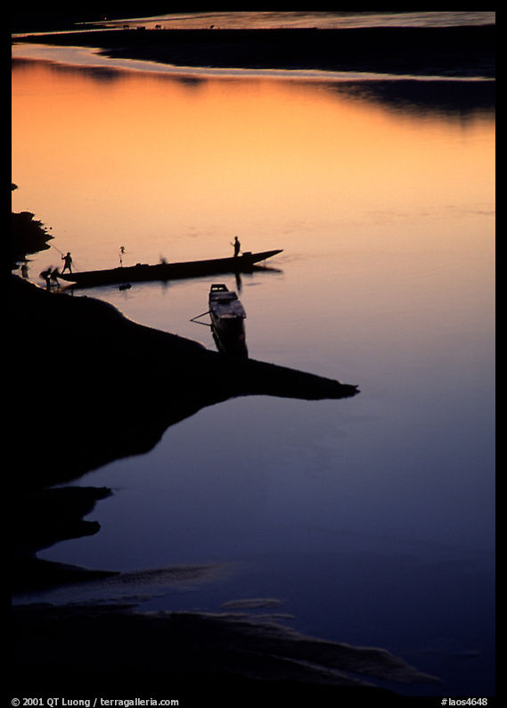 Boats, sunset on the Mekong river, Luang Prabang. Mekong river, Laos