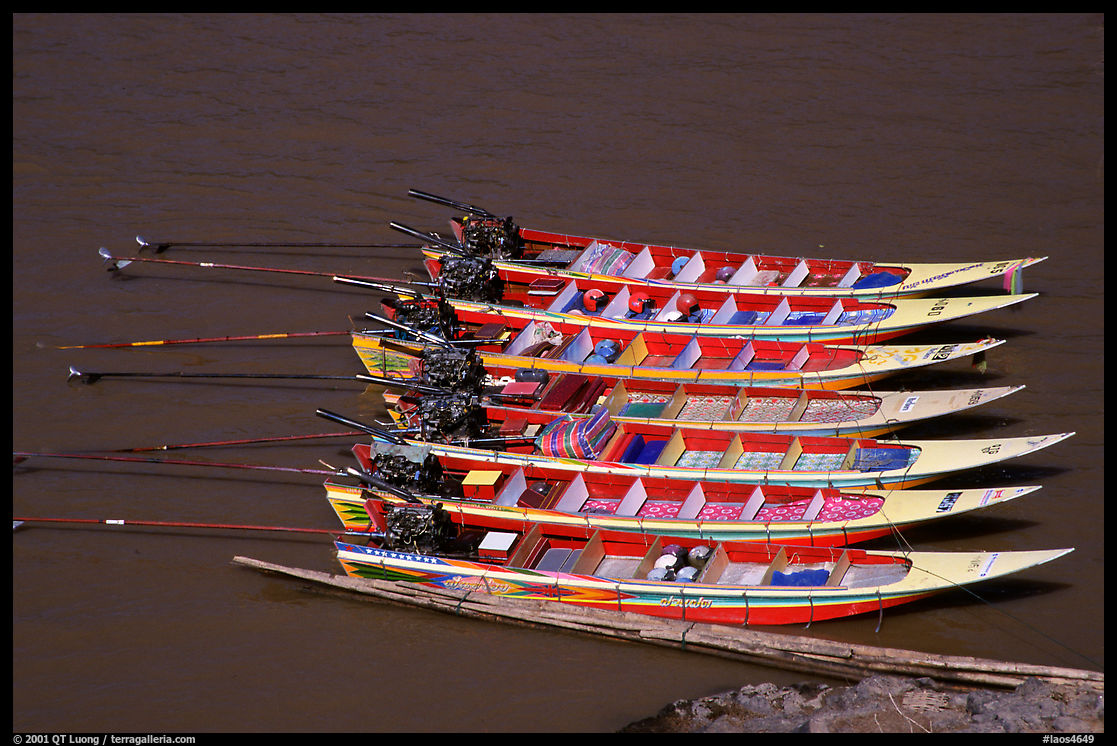 Fast boats on the Mekong river. With their 40 HPW Toyota engines, they cruise at 50 mph on the river. Mekong river, Laos
