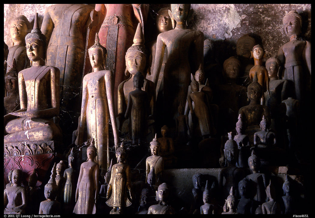 Buddha statues left by pilgrims in Pak Ou caves. Laos